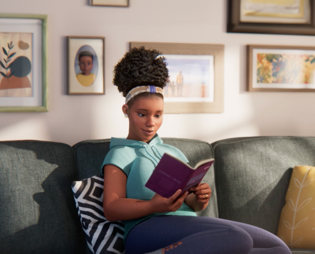 ABILIFY ASIMTUFII for bipolar disorder patient Emma reading a book.