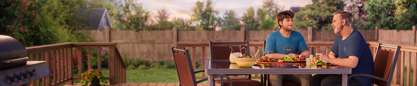 ABILIFY ASIMTUFII for schizophrenia patient and his father seated at a table on an outdoor deck, sharing a meal and conversing.